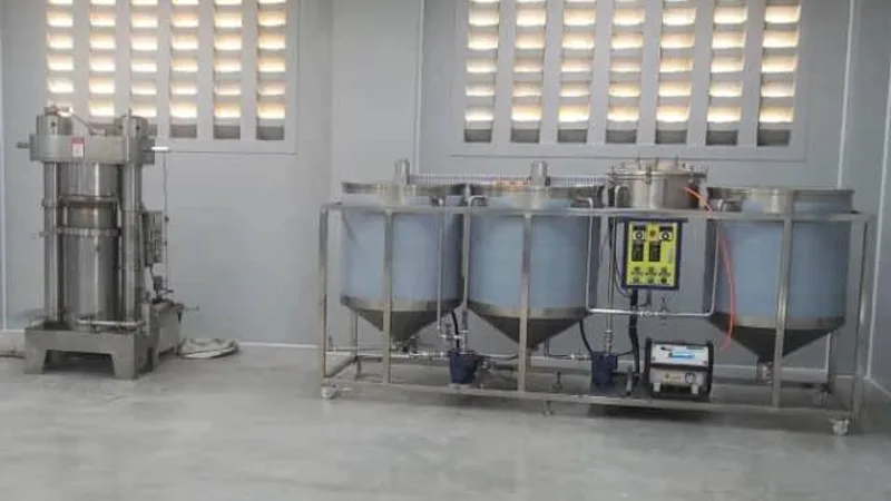 Refining tanks and presses on the production floor